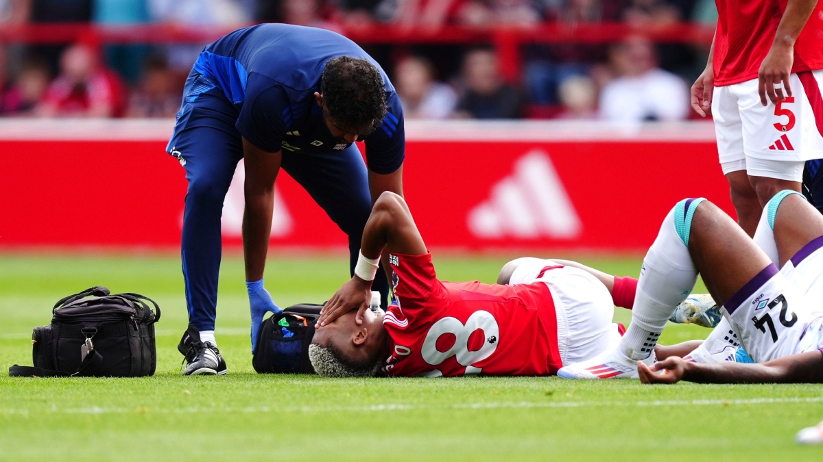 A medical personnel attending to injured Danilo A medical personnel attending to injured Danilo